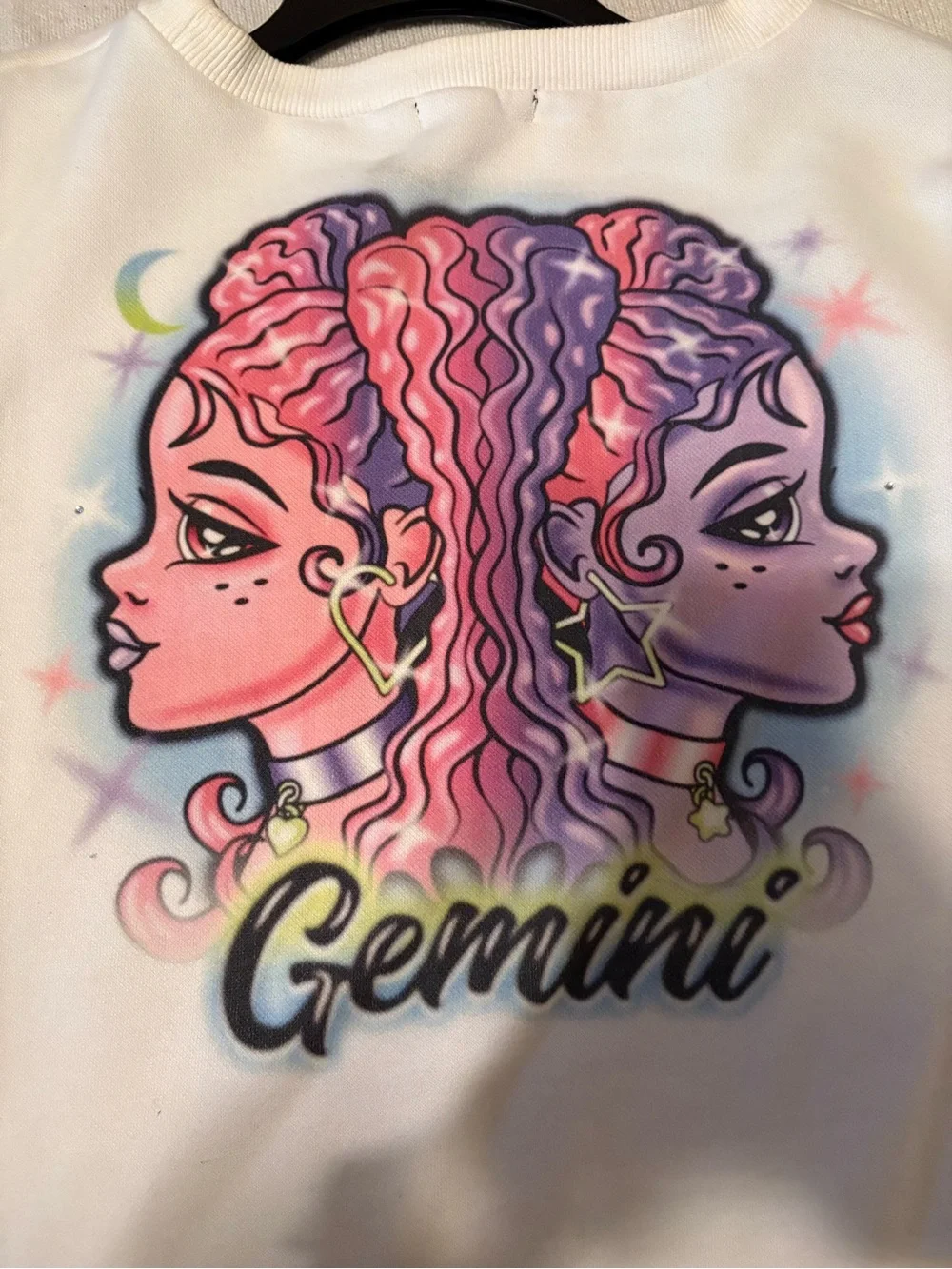 Dolls Kill White Gemini Crewneck Sweater with Pink & Purple Graphic